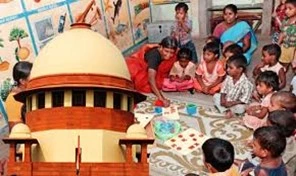 This image shows a room of an institution in which children sitting on the floor, a caregiver guiding them as if she is doing an activity, and a structure of the Supreme Court in the foreground